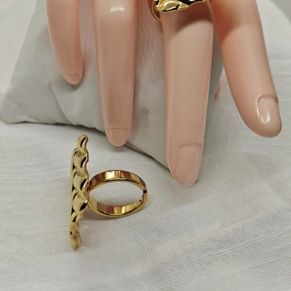 Gold textured stainless steel statement ring close-up – Herdise