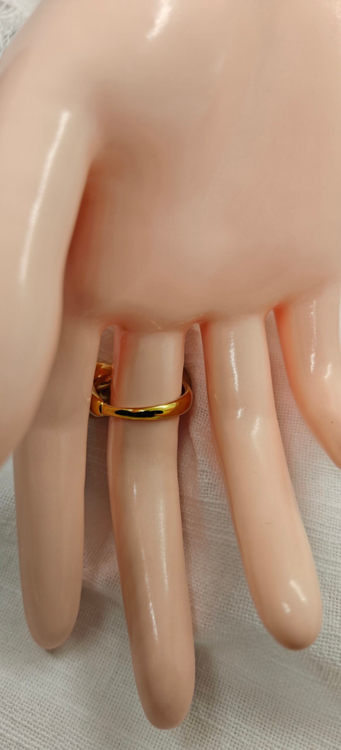 Size 7,8,9 and 10 gold-plated stainless steel knot ring.