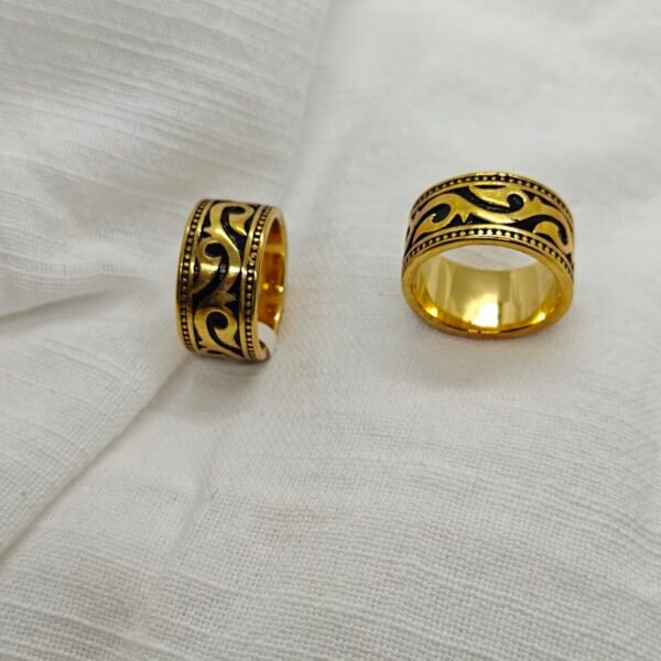 Size 9 bold tribal stainless steel gold-plated ring.