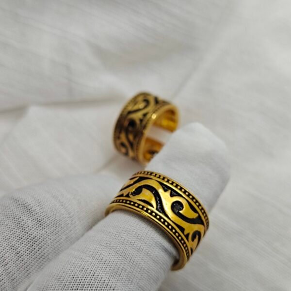 Size 8 bold tribal stainless steel gold-plated ring.