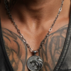 “Wolf head stainless steel pendant necklace with oval chain.”