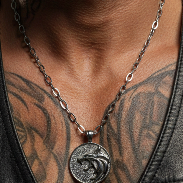 “Wolf head stainless steel pendant necklace with oval chain.”