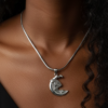 Dragon moon stainless steel pendant necklace on snake chain.