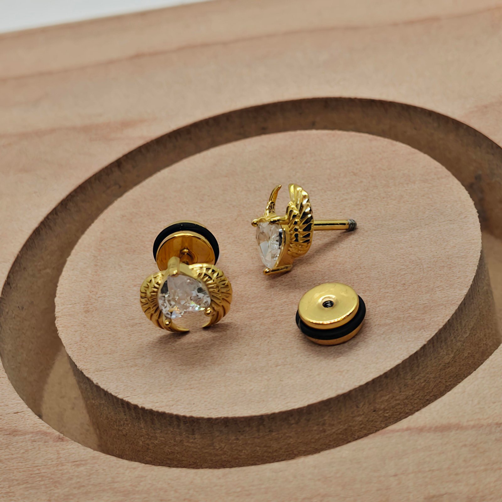 winged heart screw back earrings gold with clear stone