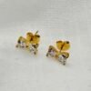 gold bow stud earrings