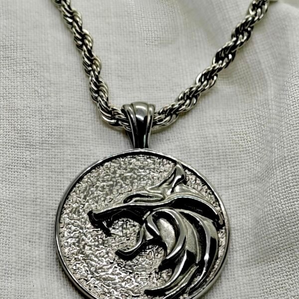 “Wolf head stainless steel pendant necklace with 24" rope chain.”
