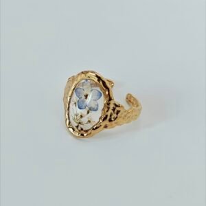 Size 10 Gold-tone floral statement ring showing textured frame and open-band design