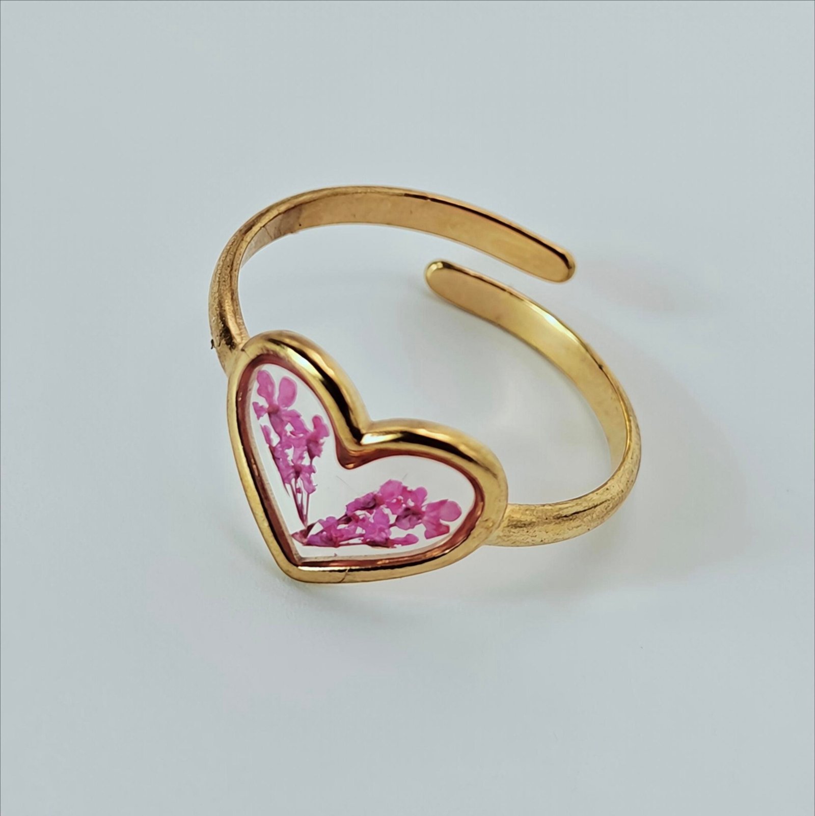 Size 10 Rosé Bloom gold-tone ring with transparent heart and delicate pink floral details