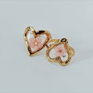 HERDISE Sakura Bloom gold-tone heart ring with pink flower and transparent centerpiece