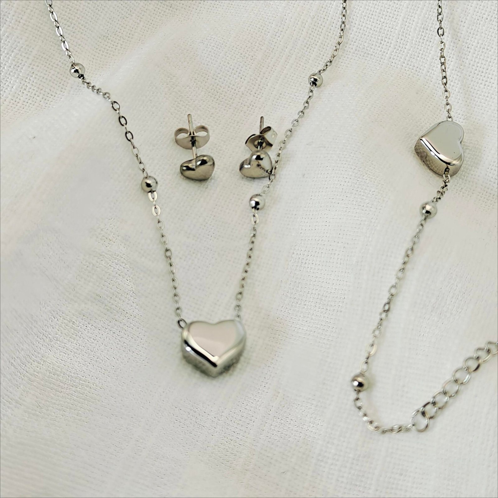 HERDISE silver-tone heart necklace bracelet and matching heart stud earrings set