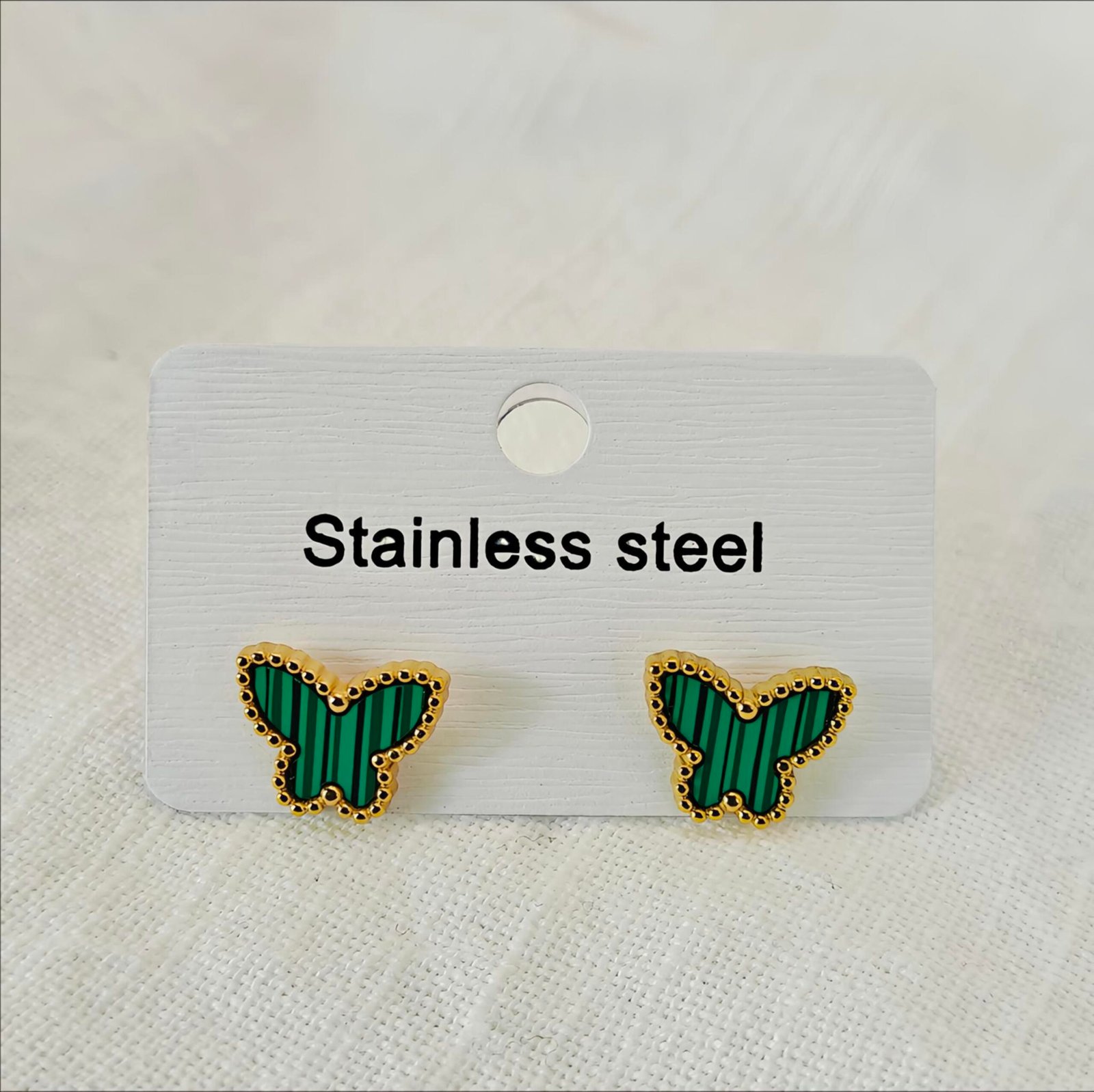 HERDISE emerald-green butterfly stud earrings with gold-tone beaded borders and dark striped wings
